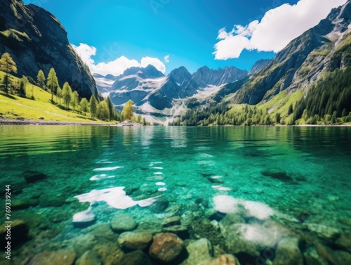 A beautiful lake surrounded by mountains with a clear blue water