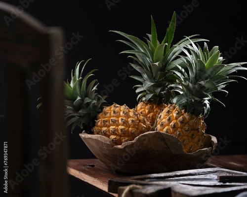 pineapple on darkmood photography photo