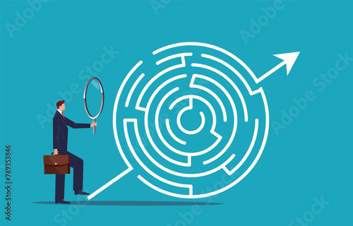 Finding a way out or an exit, a new opportunity or solution, a challenge to overcome difficulties, a businessman with a magnifying glass standing at the entrance to a maze looking for the direction of