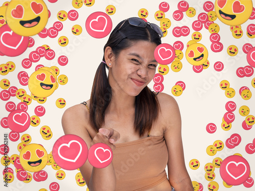 Obraz na plátně A popular Gen Z female influencer garnering love and heart eye emojis signifying overwhelming fan affection and support online or on social media platforms