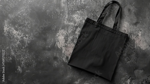 Mockup of black blank canvas tote bag with grunge textured background, eco textile shopping sack with copy space, AI generated