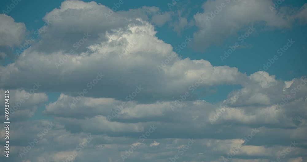 High dynamic range white clouds drifting timelapse, sunny day with blue sky High dynamic range white clouds drifting timelapse, sunny day with blue sky