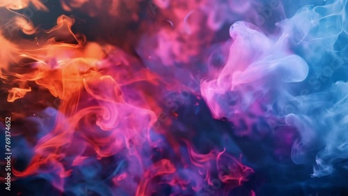 Bursting with energy multicolored wisps of smoke dance and ebb against the inky blackness.