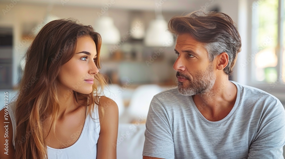 A man and a woman seated side by side