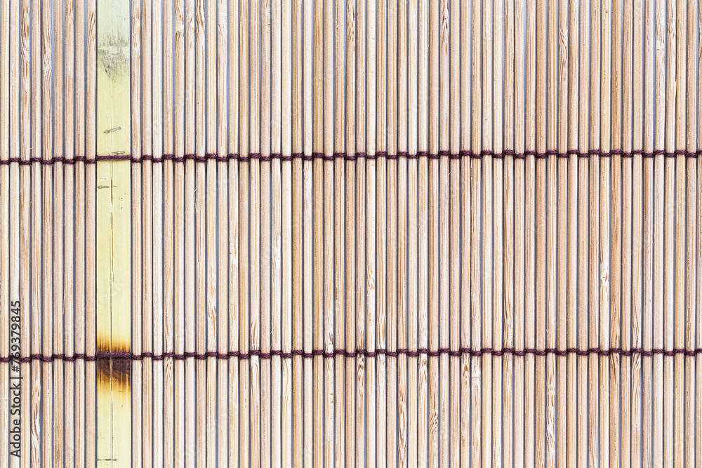 Bamboo mat background. The asian mat from bamboo. natural decor Bamboo mat background. The asian mat from bamboo. natural decor