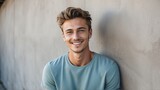 Portrait of young handsome caucasian man smiling happy looking camera with confidence on concrete wall background from Generative AI