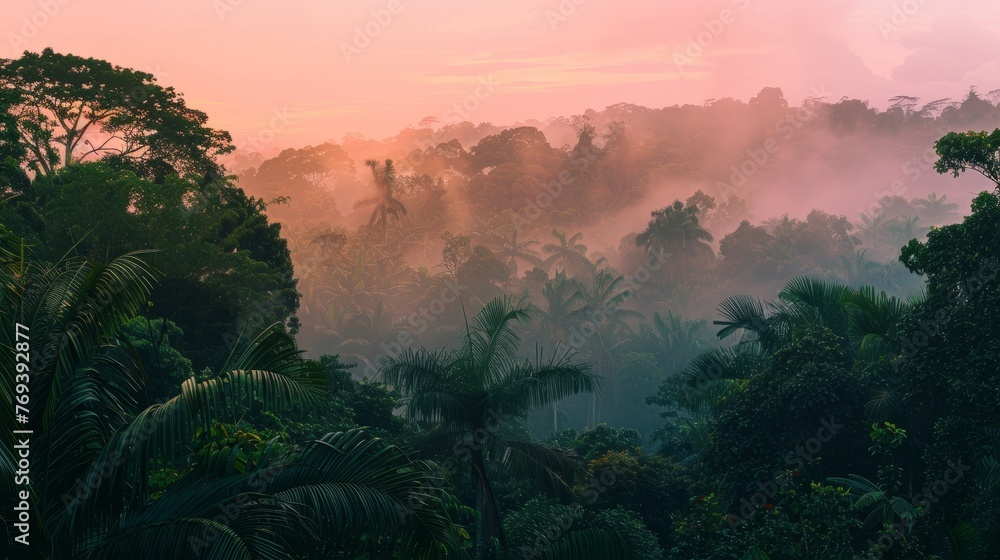 The sun dips below the horizon, casting a warm peach-toned glow over the lush tropical forest, background, wallpaper, copy space