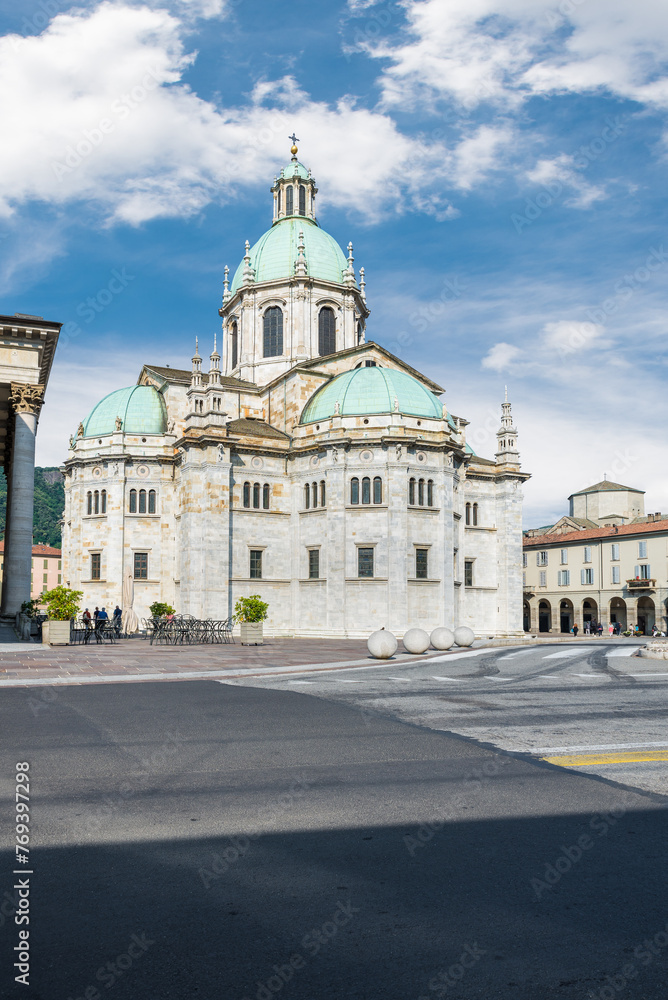 Como city, Italy in summer and the historic center with the Santa Maria Assunta cathedral also known as the Duomo of Como seen from square Giuseppe Verdi    
