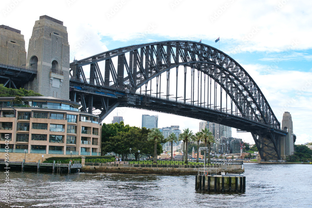 SYDNEY, AUSTRALIA - MARCH 14, 2022: A view of the harbour and Sydney Opera House. Sydney Opera House and harbour view. Opera House Australia near Sydney harbour bridge. Opera house - Australian symbol