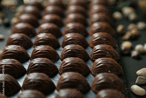 Close Up of Assorted Chocolates and Nuts Displayed on a Tray