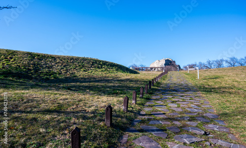 Stone path on the lawn near Devín Castle in Bratislava.