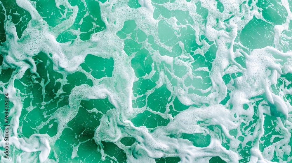 Detailed view of a green and white wall with dynamic waves resembling an ocean-inspired backdrop, background, wallpaper