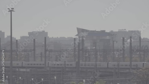 MADRID, SPAIN - DECAMBER 5 2017: train departs from Madrid Atocha is the largest railway station in Madrid. It is the primary station serving commuter trains (Cercanias). photo