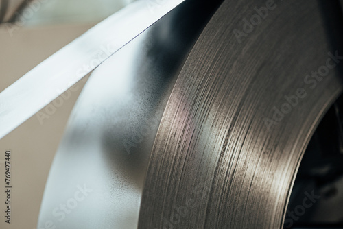 roll of raw metal steel roll in industrial factory photo