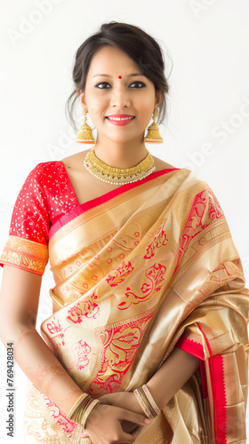 Young indian woman model wearing patola saree on white background, beautiful photo