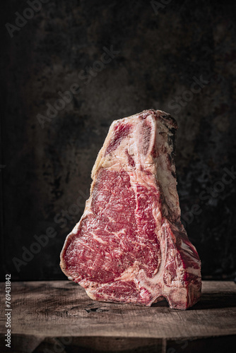 Raw Steak on Cutting Board photo