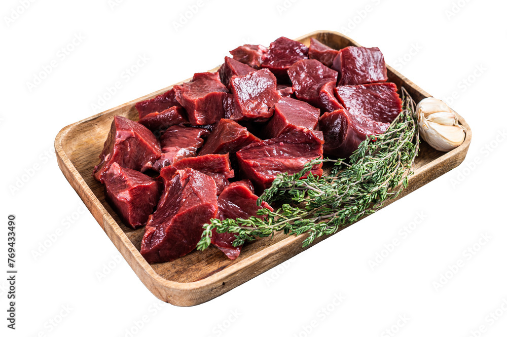Raw sliced Beef or veal heart in a wooden tray with thyme.  Isolated, Transparent background.