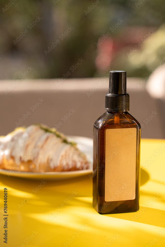 beige brown jar bottle of shampoo cream on the sea on the beach in summer