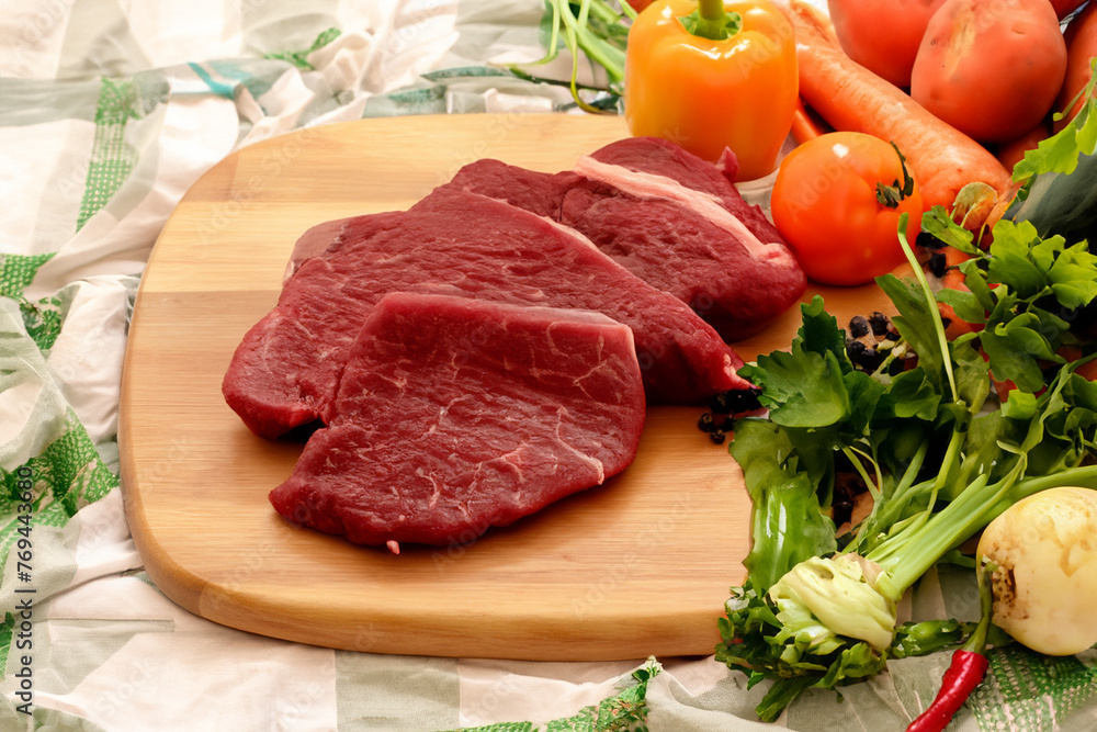 raw beef steak with vegetables raw beef steak with vegetables
