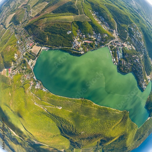 Abrau-Durso, Russia. View of Lake Obrao, mountains, and vineyards. Summer. Aerial view photo