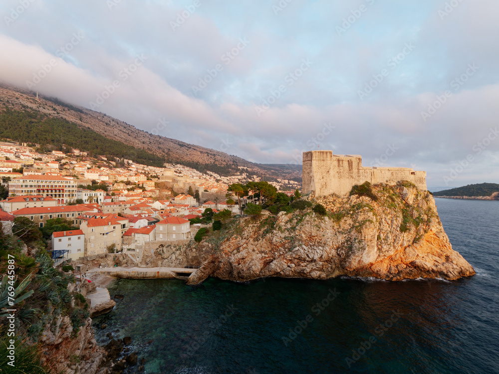 View of the Old historic city of Dubrovnik in Croatia, UNESCO World Heritage site. Famous tourist attraction in the Adriatic Sea. Fortified old city. Tourism and travel to Croatia.