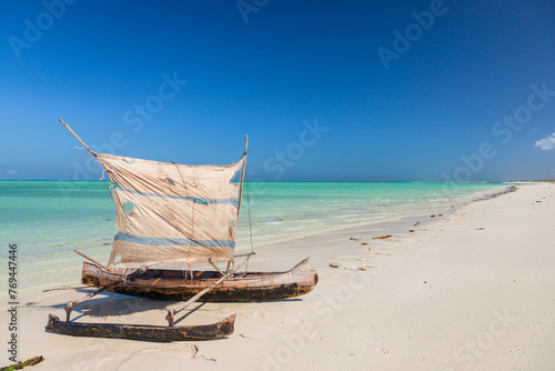 Fototapeta Naklejka Na Ścianę i Meble -  Lakana boat on the beach in Mamirano bay, madagascar