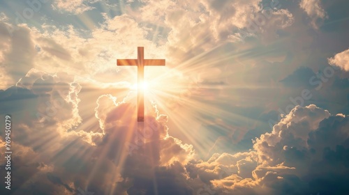 Cross, clear silhouette on the background of light clouds, rays of the sun illuminate it from behind, power of faith, light bright background, wallpaper © shooreeq