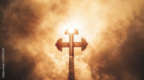 Symbol of atheism floating in the air, clear silhouette on the background of light clouds, sun rays illuminate it from behind, the power of faith, light bright background photo