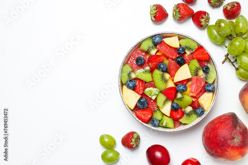 Tasty and healthy nutrition concept - fruit salad