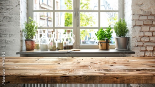 A wooden table sits in front of a window  illuminated by natural light