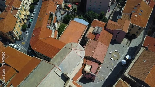 Aerial overview of buildings and streets in Taggia city, in sunny Liguria, Italy photo
