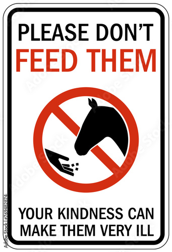 Do not feed the horses sign please don't feed them. Your kindness can make them very ill