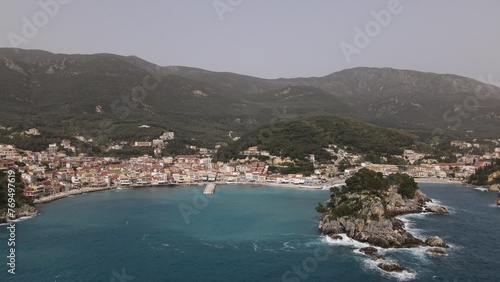 Fototapeta Naklejka Na Ścianę i Meble -  aerial view wild sea waves crushing on rocks in parga town epirus greece