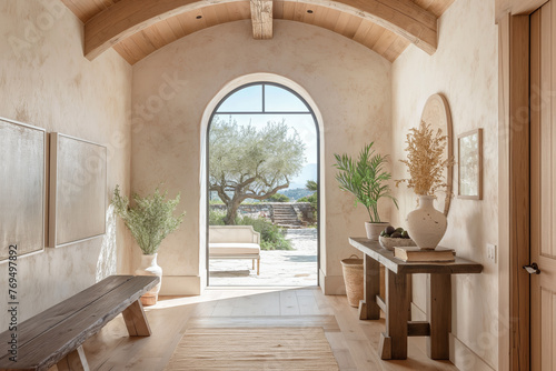 Mediterranean Style Entryway with Archway and Natural Decor. Rustic Elegance in a Bright Hallway with Vaulted Ceiling and View