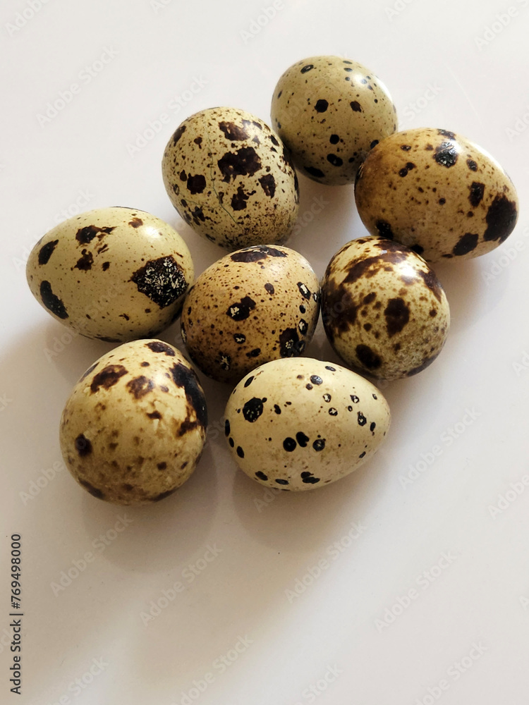 Quail eggs. Group of quail eggs on a white background Quail eggs. Group of quail eggs on a white background