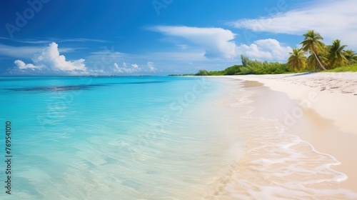 White sandy beach, clear water, and a pristine sky.