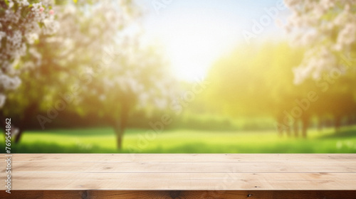 Wooden table spring nature bokeh background, empty wood desk product display mockup with green park sunny blurry abstract garden backdrop landscape ads showcase presentation. Mock up, copy space .