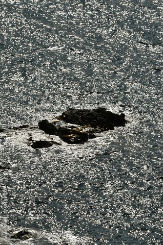 rocky coast kalymnos island greece sumer sun aegean  photo