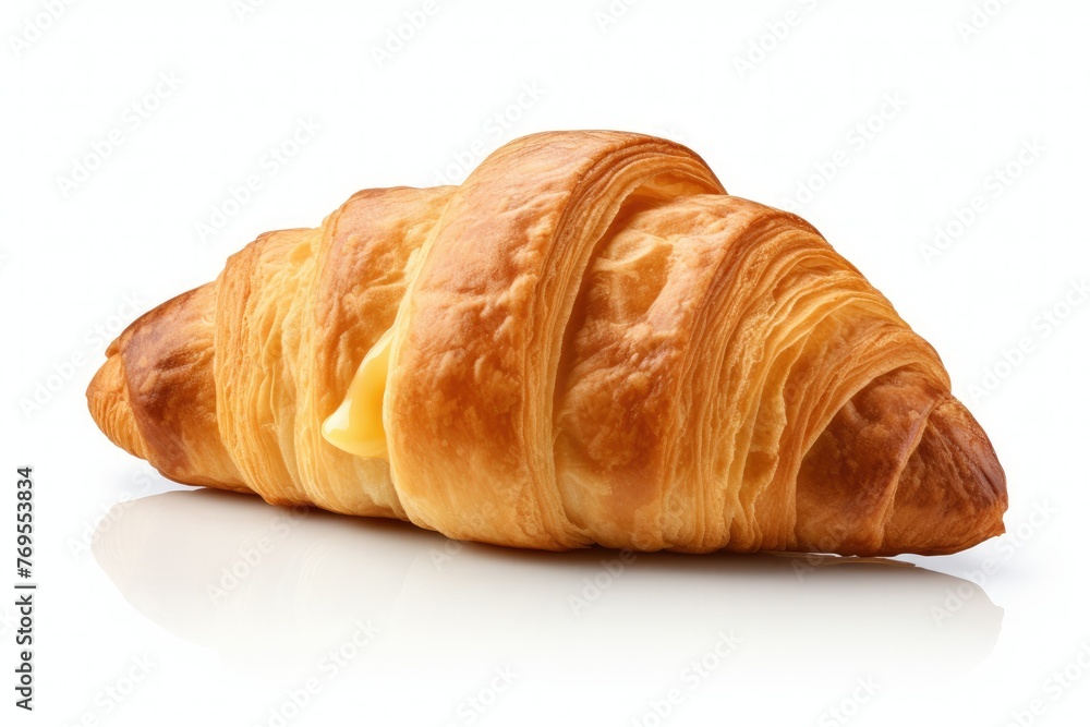 Fresh croissant with melting butter on white background