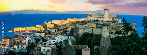 Italy travel. Gaeta - beautiful coastal town in Lazio region. cityscape with medieval castle and the sea over sunset photo