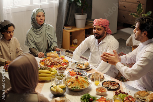 Muslim Family Enjoying Festive Dinner On Uraza Bayram