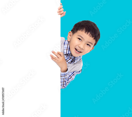 Happy Asian boy  holding with white  empty banner