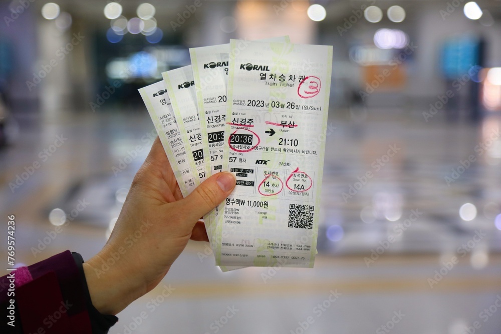 GYEONGJU, SOUTH KOREA - MARCH 26, 2023: Tourist holds Korail KTX high