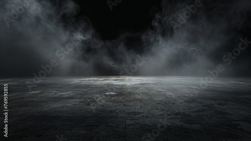 Abstract image of dark room concrete floor. Black room or stage background for product placement.Panoramic view of the abstract fog. White cloudiness, mist or smog moves on black background photo