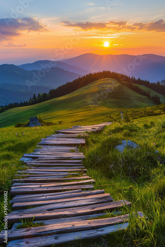 A wooden path through beautiful green hills during sunset #769596082