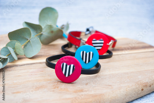 Choice of fun polymer clay bracelets with striped hearts.