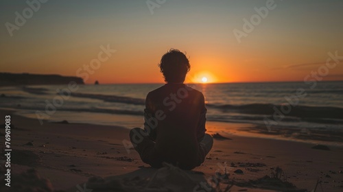 Person Enjoying a sunset from a simple, quiet beach