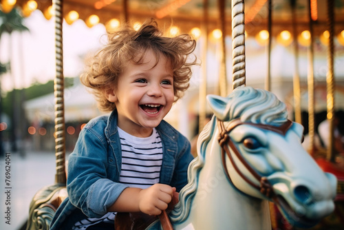 Generated AI image of happy little baby child having fun on a carousel at an amusement park in the evening © Tetiana