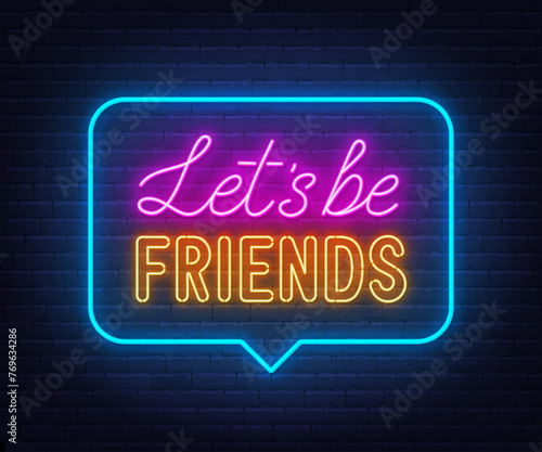 Lets Be Friends neon sign in the speech bubble on brick wall background.