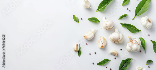 garlic with leaves isolated on white background